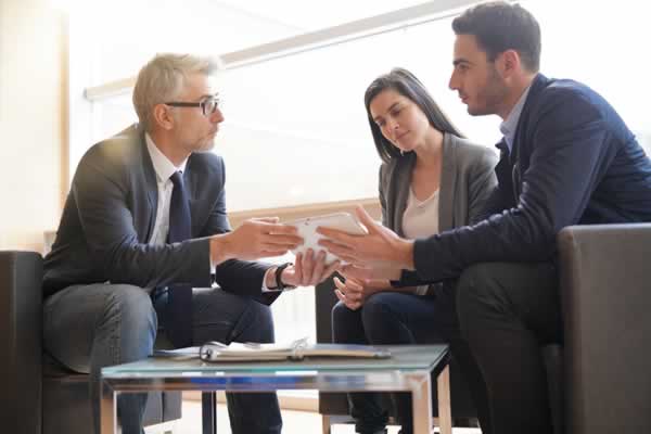 Realtor talking with clients