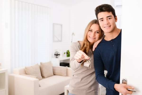 Couple holding keys