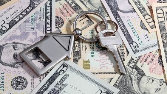 Picture of cash with keys on top
