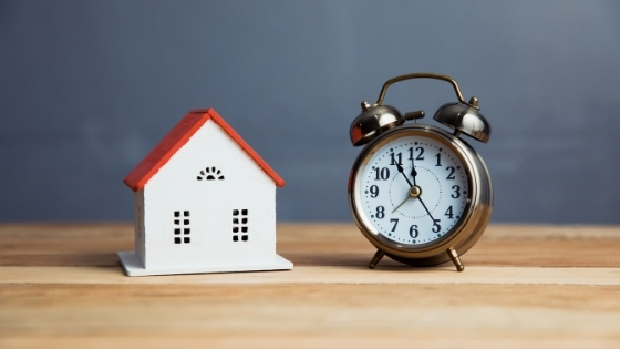 Picture of miniature house and clock