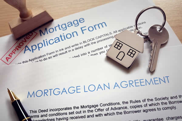Mortgage contract with set of keys on top