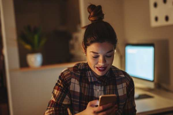 Woman using cell to make call