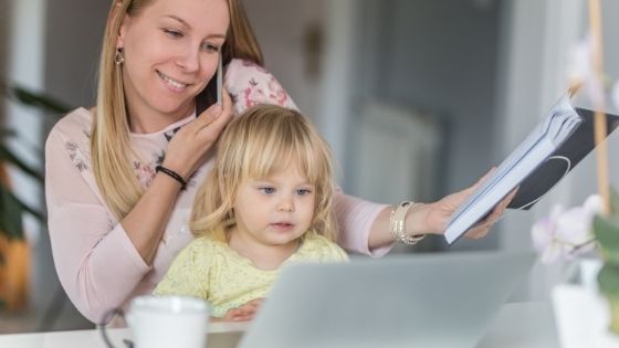 Mother and child in front of computer